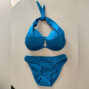 Venus bikini top and bottom in deep turquoise color.